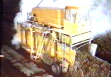 large machines turn the compost regularly
